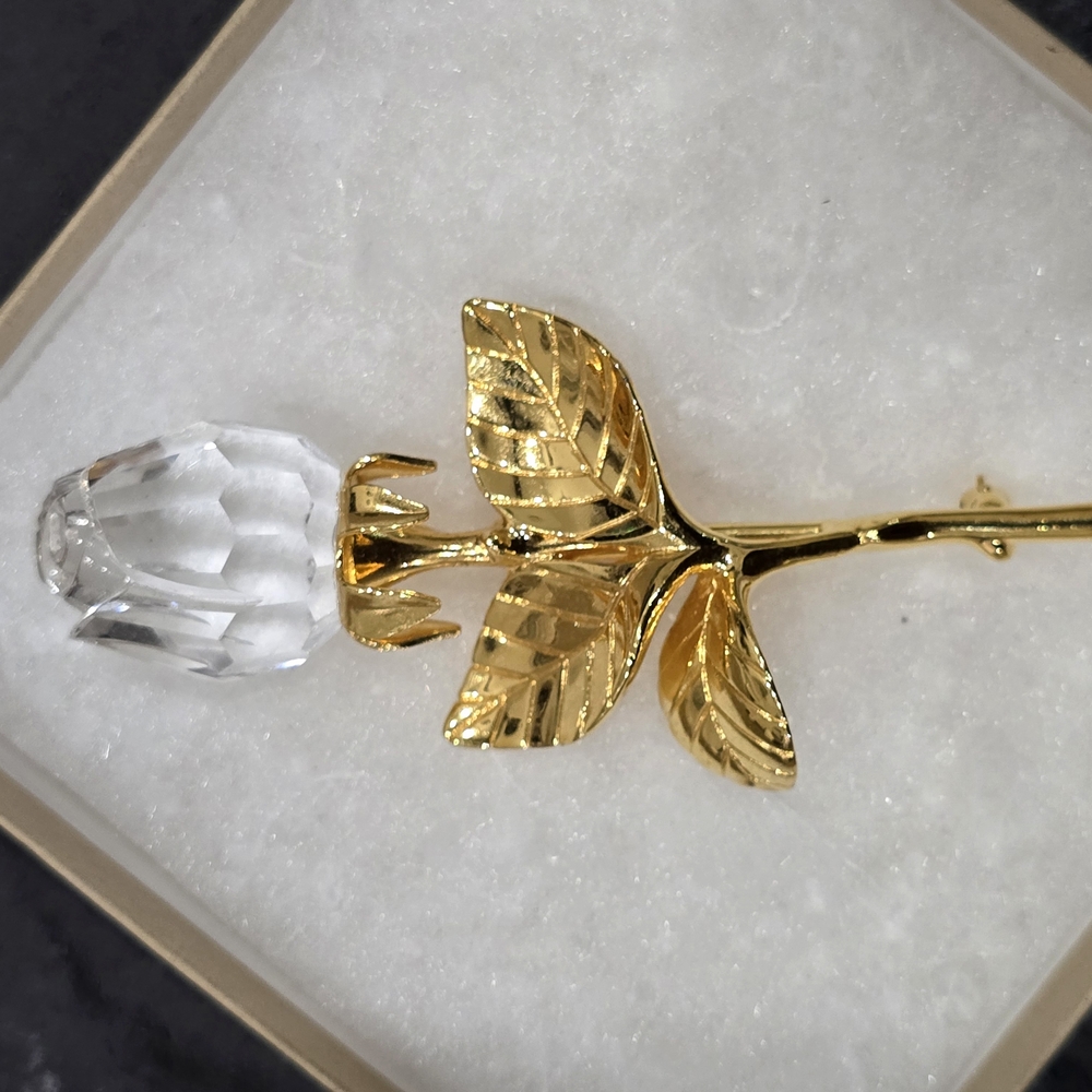 Elegant Gold and Crystal Leaf Brooch